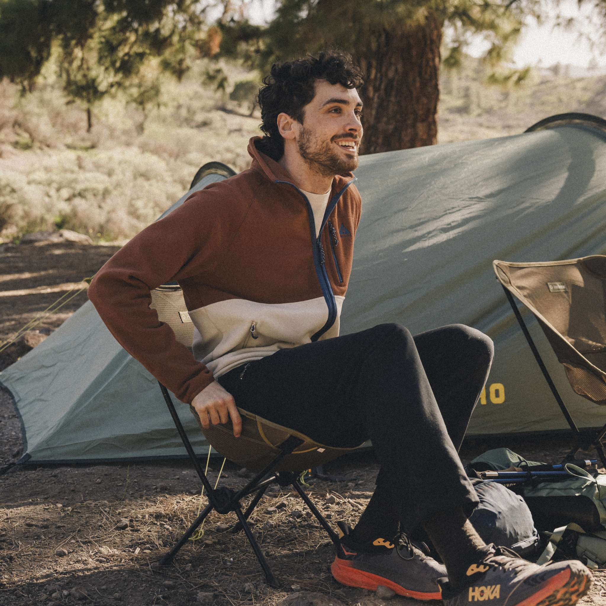Man sitting down on Ayaucho camping chair