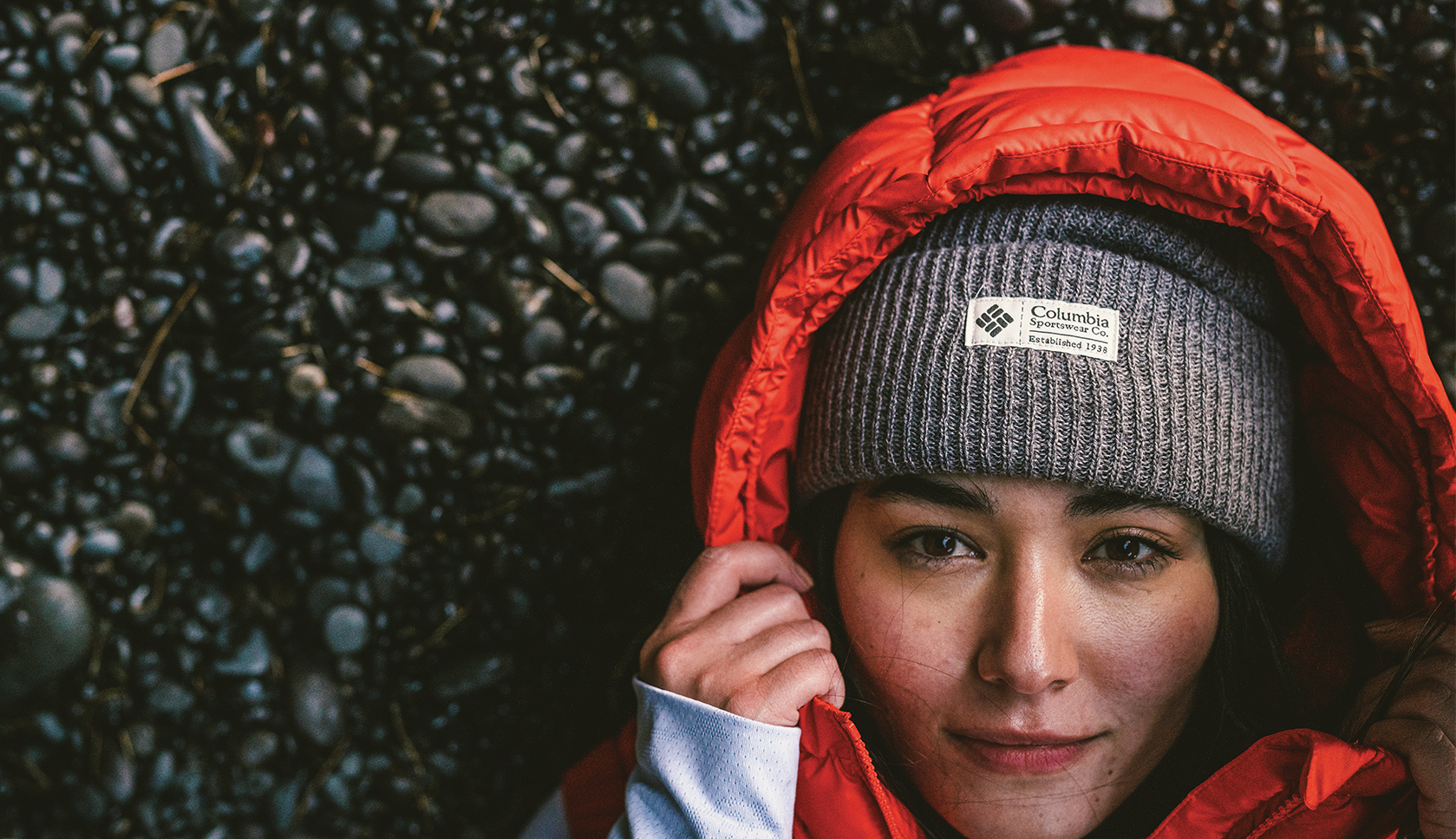 Woman wearing a Columbia grey hat