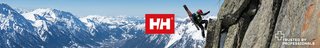 A man wearing Helly Hansen gear is climbing a rock somewhere in snowy mountains, there is a Helly Hansen logo in the centre of the image.