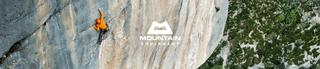 Rock climber scaling a rockface