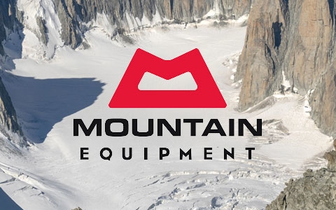 Rocks and snow with the Mountain Equipment brand logo in the middle.