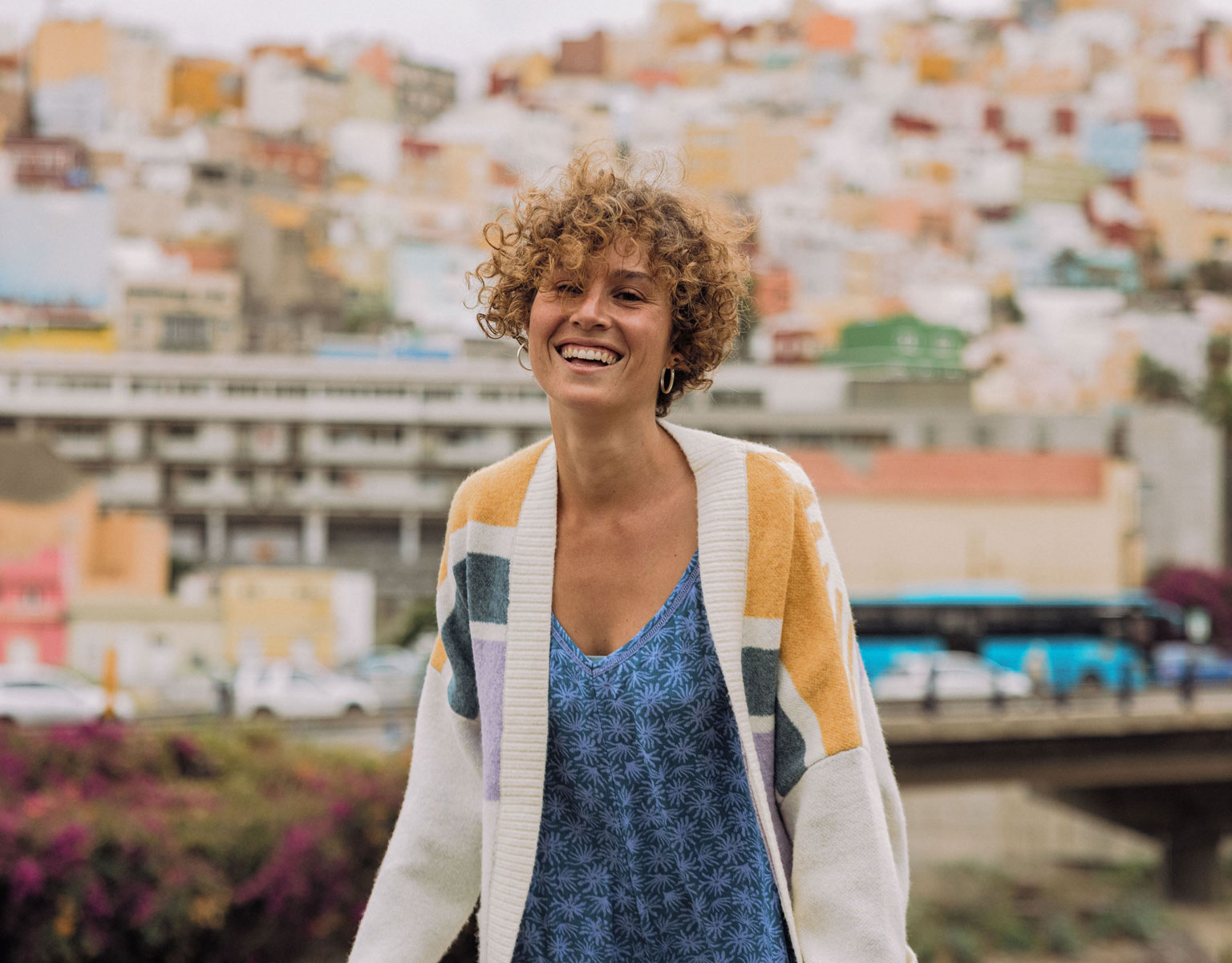 Woman wearing the Sunsets Recycled Knitted Cardigan