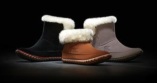 Three different Sorel slippers - brown, black, and grey