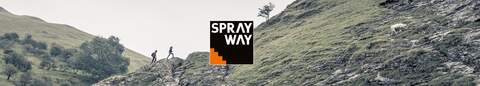 Two people in Sprayway clothing, walking up a hill
