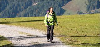 Woman on a walk through a valle