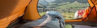 View from inside a sleeping bag in a tent