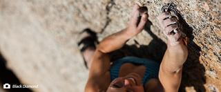 Close up from above of climber on rock face