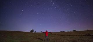 Man looking up at sky
