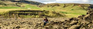 Man trail running through Icelandic Landscape