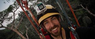 Man With headtorch in the Jungle