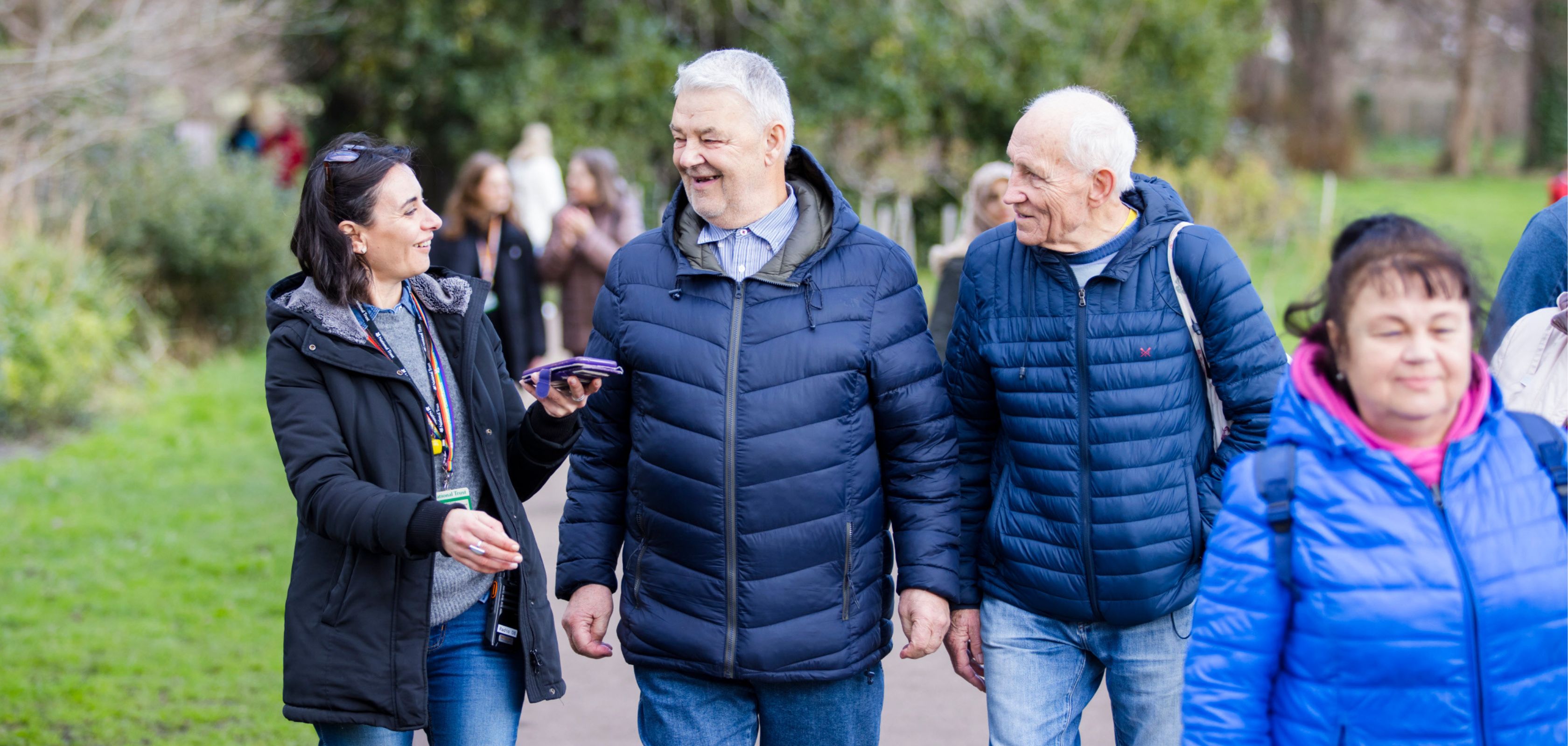 People walking along a footpath outside