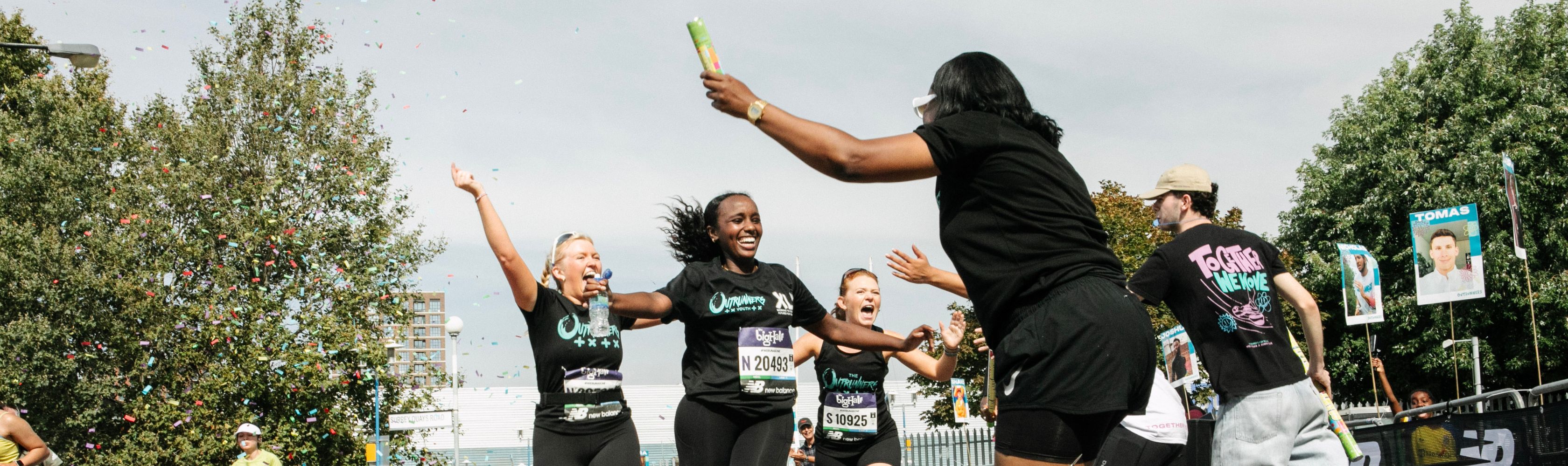 Runners crossing a finish line