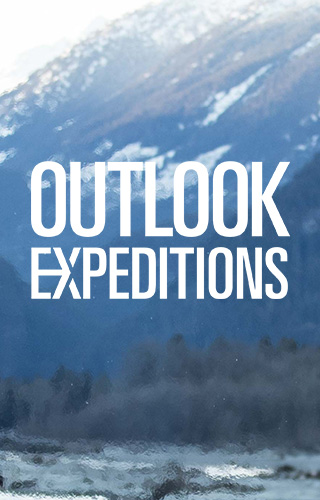 Outlook Expeditions - Man reading stories to children