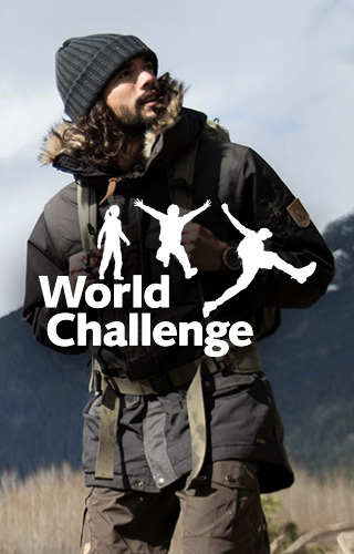 World Challenge group walking in field.