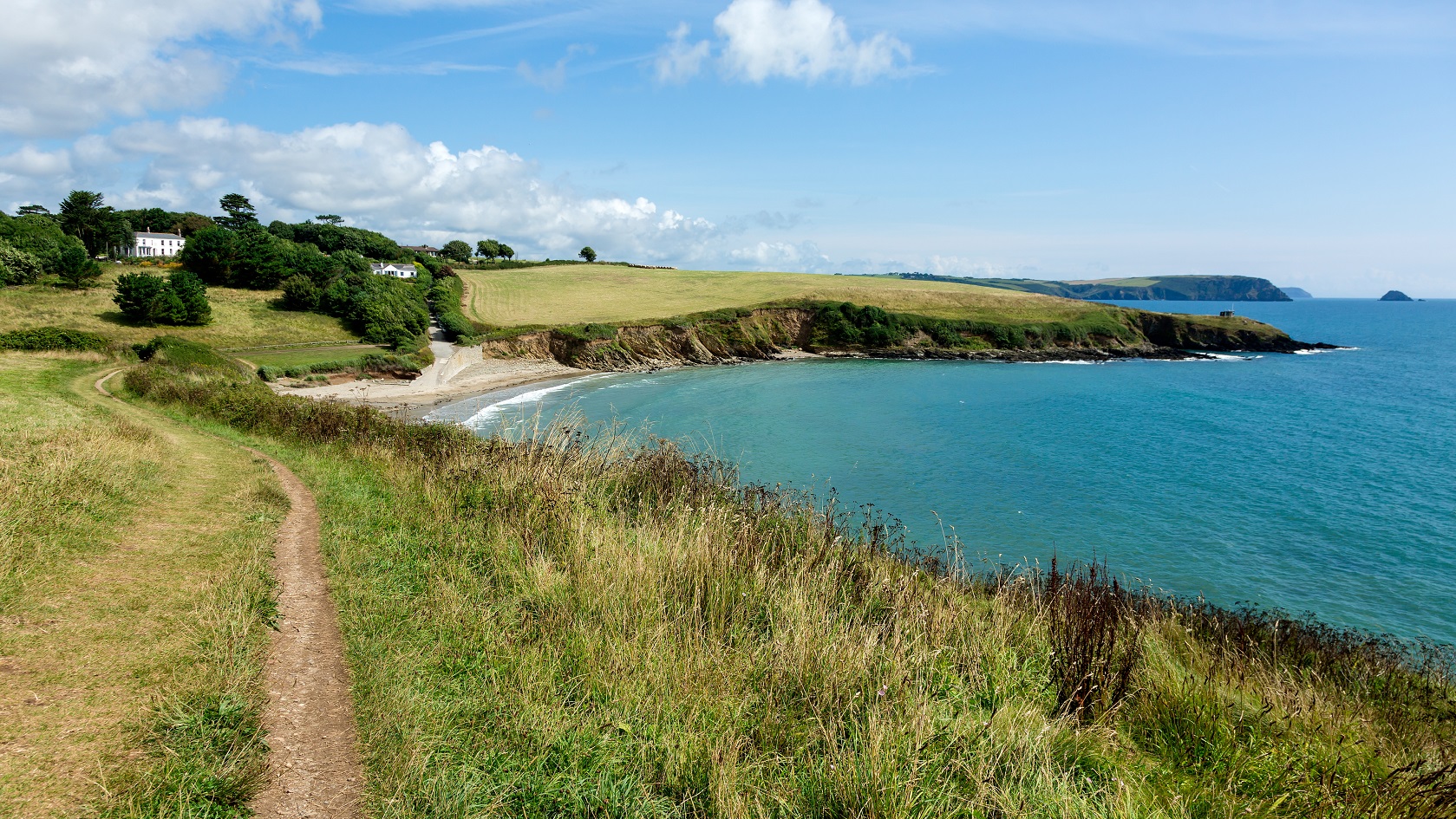 Coastal Pathway leading to Porthcurnick Beach Cornwall England Landscape