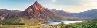 Evening light on Mount Tryfan above Llyn Ogwen in Snowdonia National Park in Wales