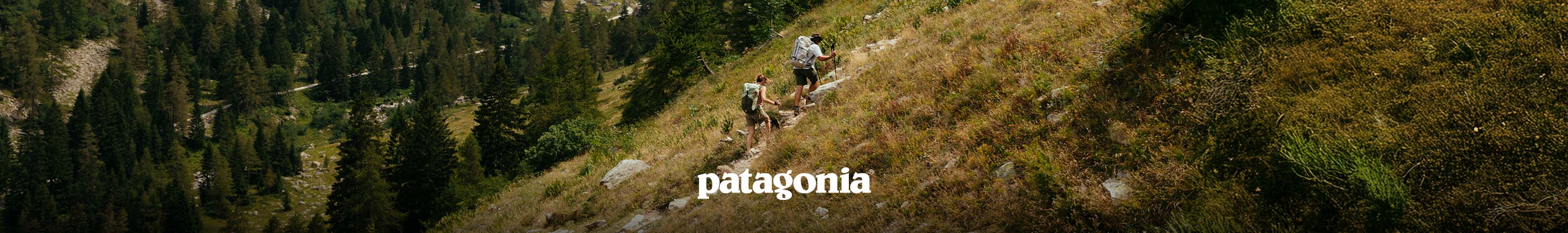Patagonia 2 people walking up a hill