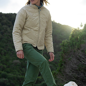 Woman wearing jacket walking in the outdoors