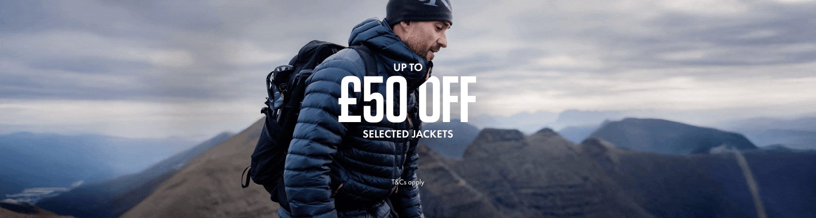 Up to £50 off selected jackets.  People are hiking, wearing jackets 