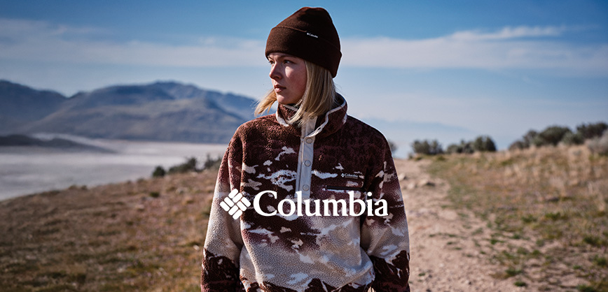 Woman wearing a warm Columbia fleece in the mountains