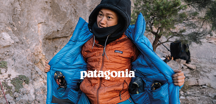 Woman in the mountains with Patagonia gear