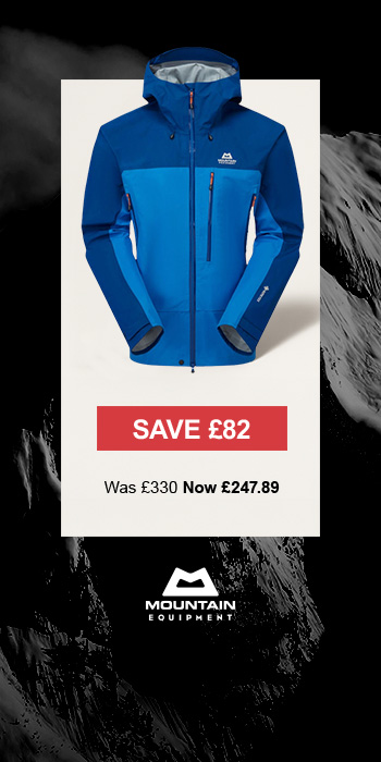 Man sitting in front of a christmas tree