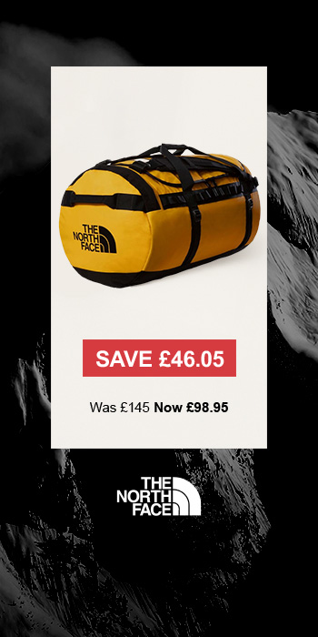 Man sitting in front of a christmas tree