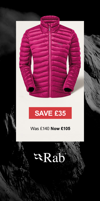 Man sitting in front of a christmas tree