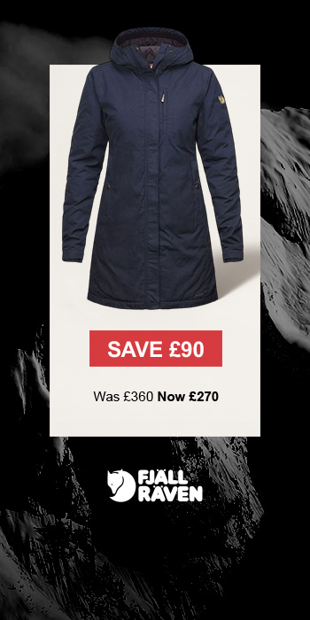 Man sitting in front of a christmas tree