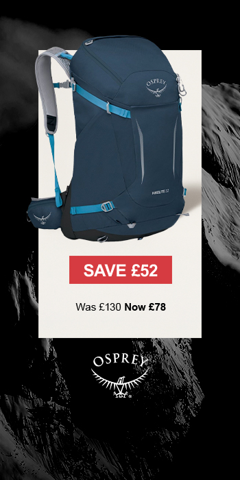 Man sitting in front of a christmas tree