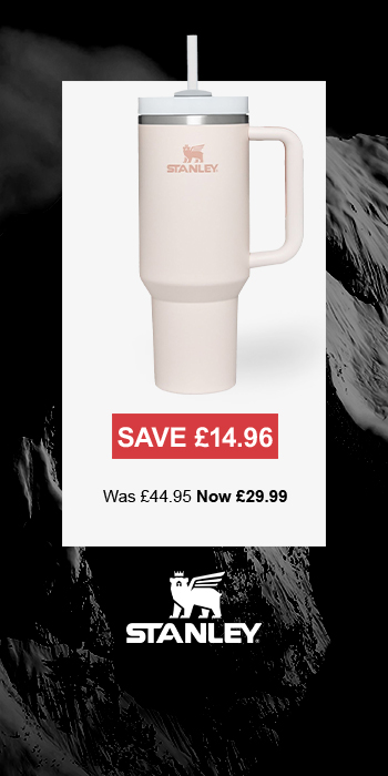 Man sitting in front of a christmas tree