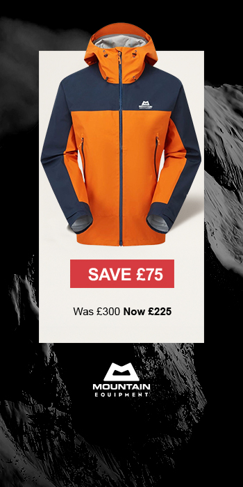 Man sitting in front of a christmas tree