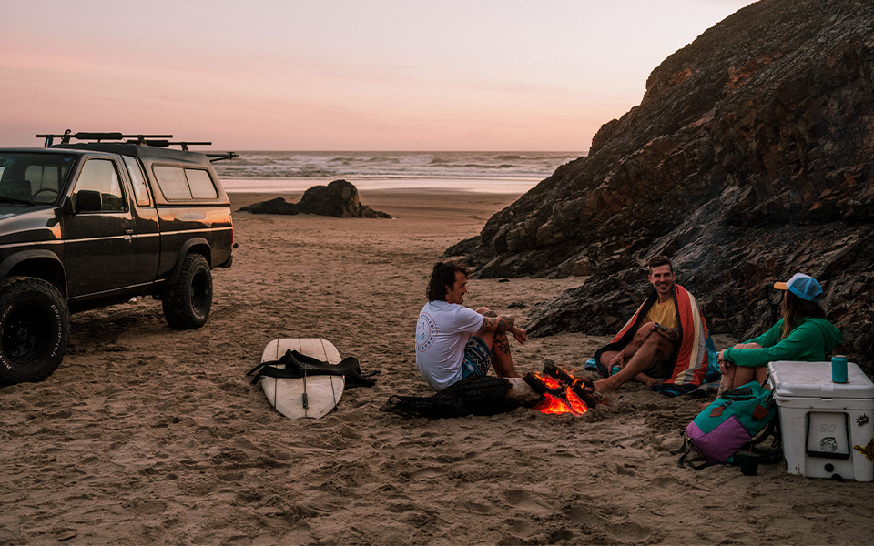 Woman wearing the Sunsets Recycled Knitted Cardigan