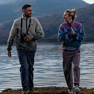 Shop new arrivals in outdoor gear. A couple on a hike