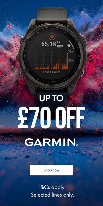 Women walking in the mountains with hiking poles and backpack