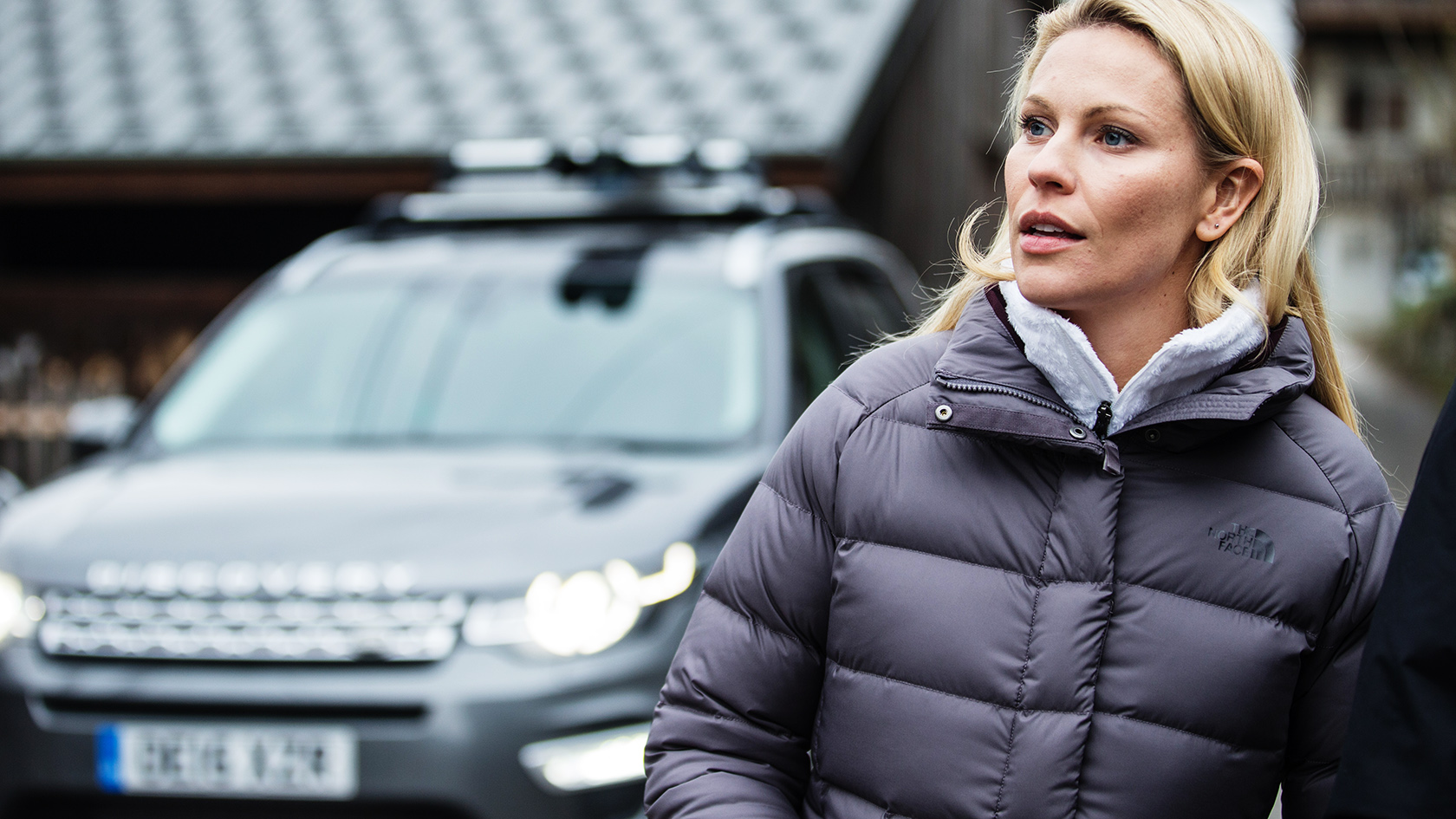 A woman wearing a North Face insulated jacket 